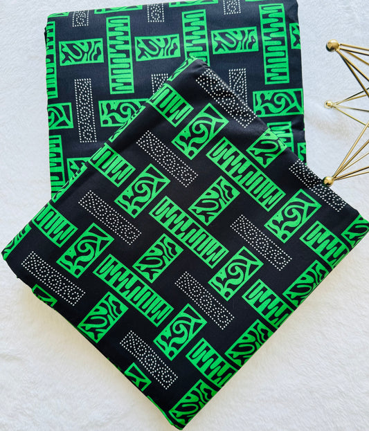 Patterned Fabric with Green and White Geometric Designs