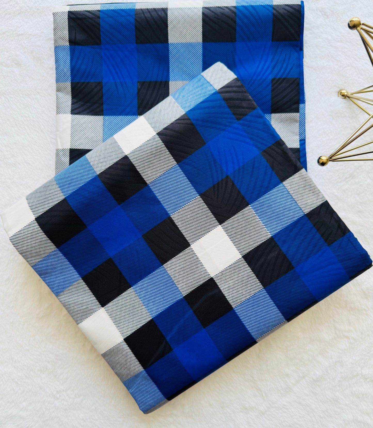 Close-up of a Blue, Black, and White Checkered Fabric